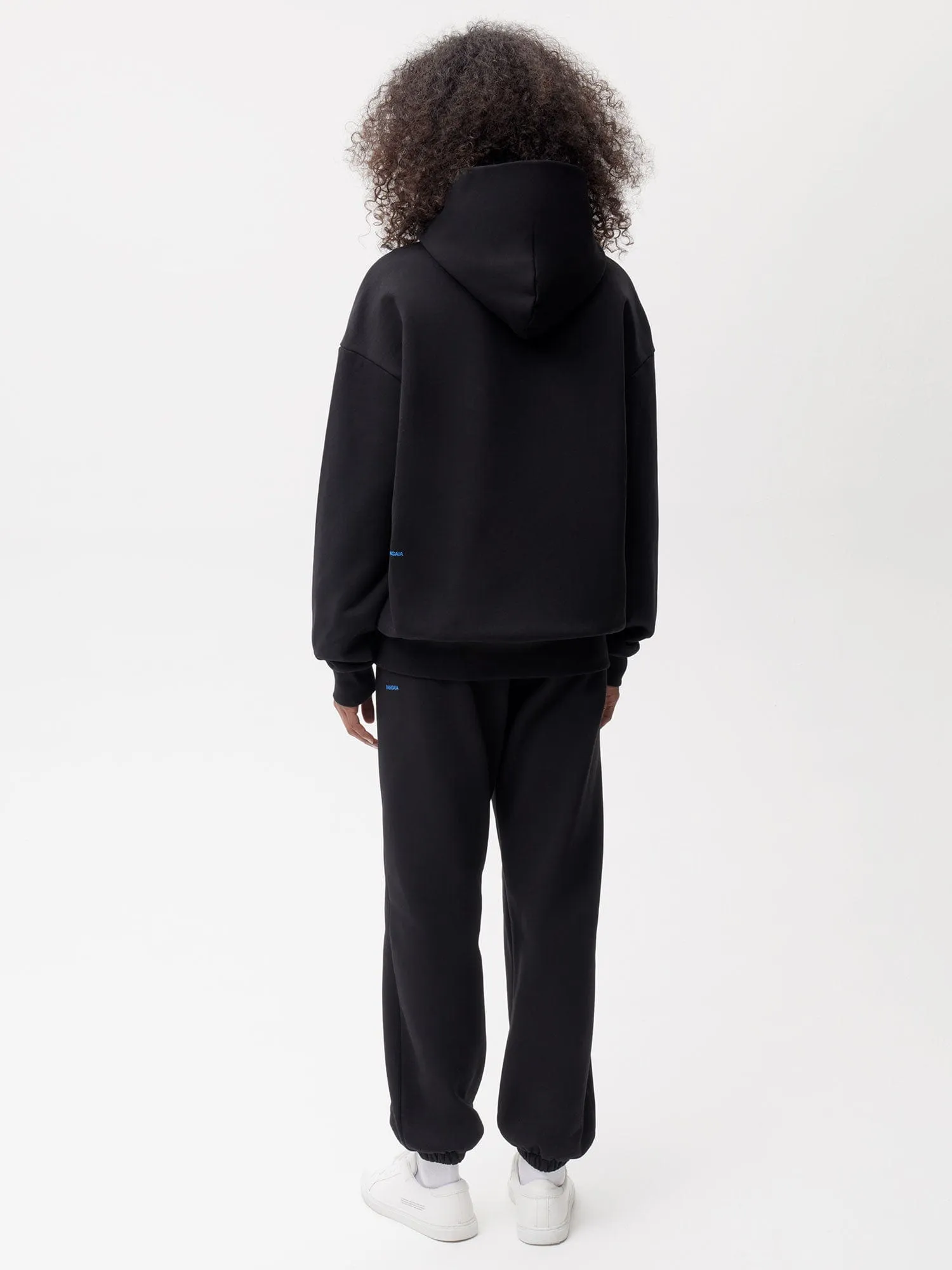 In Conversion Cotton Track Pants—black